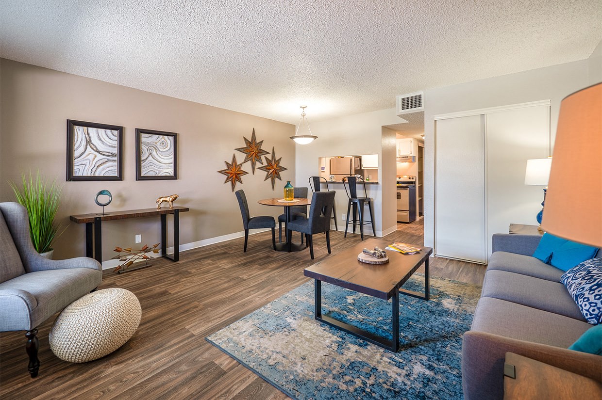 a living room with a couch and a table